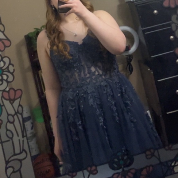 A size 10 prom dress from David’s bridal that is a shade of blue. - Picture 5 of 6